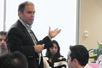 Peter DeMarco, founder of Priority Thinking, giving a presentation
